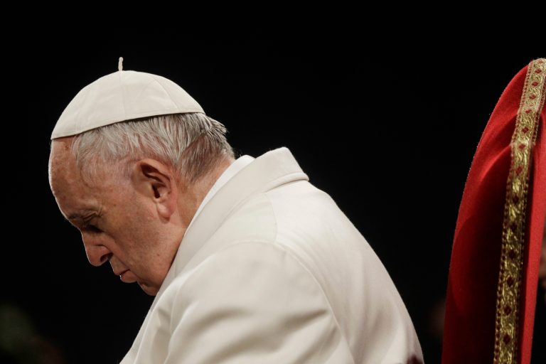 Pope Francis presides over the Via Crucis (Way of the Cross) torchlight procession on Good Friday, a Christian holiday commemorating the crucifixion of Jesus Christ and his death at Calvary, in front of Rome's Colosseum, Friday, March 30, 2018.