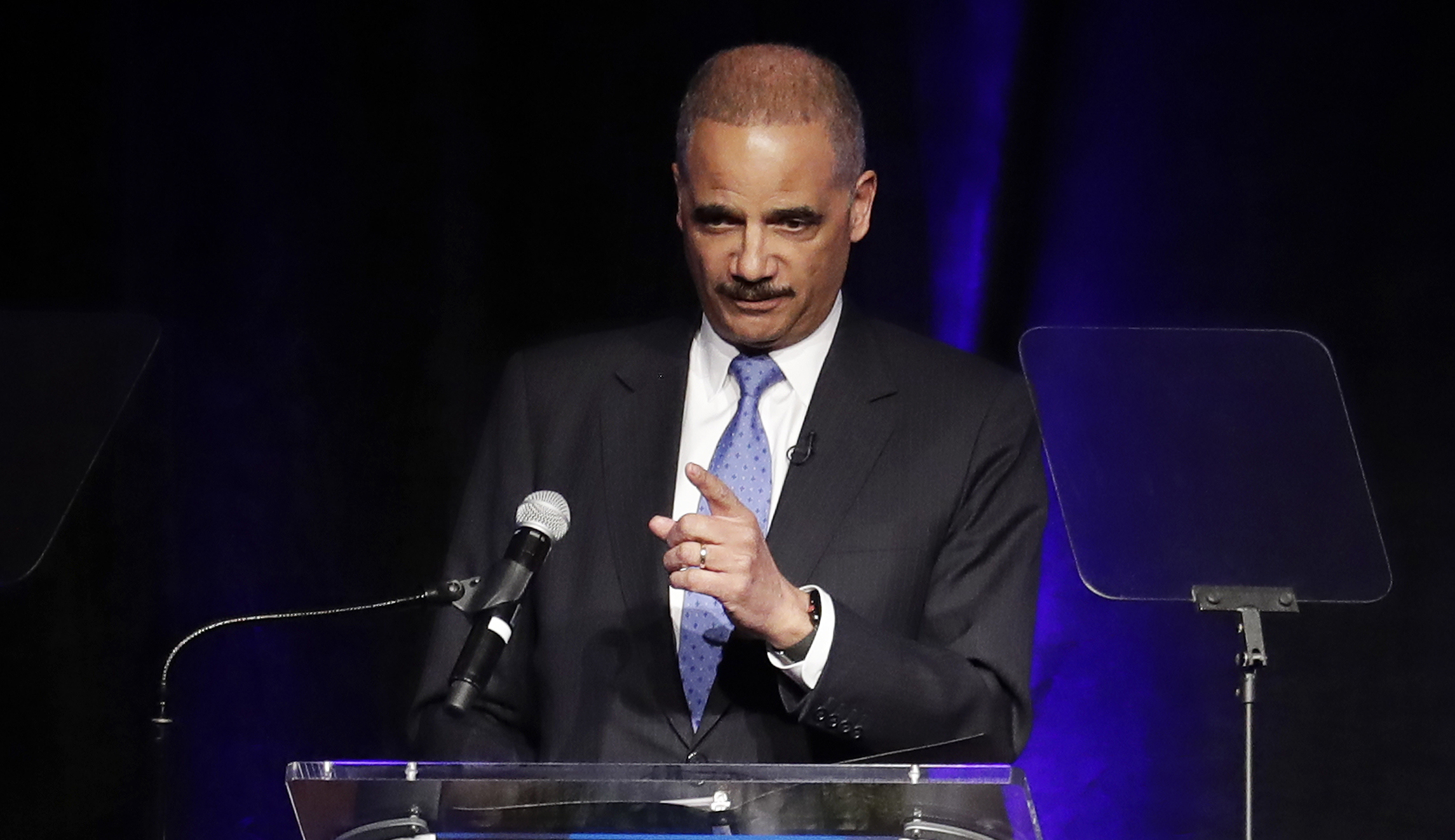 Former Attorney General Eric Holder speaks at an event.