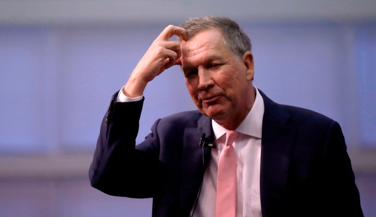 Republican Gov. John Kasich, a former 2016 Presidential hopeful, scratches his head during a visit to New England College in Henniker, N.H., Tuesday, April 3, 2018.