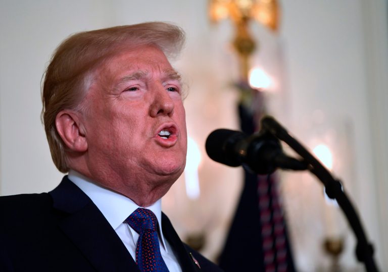 President Donald Trump speaks in the Diplomatic Reception Room of the White House on Friday, April 13, 2018, in Washington, about the United States' military response to Syria's chemical weapon attack on April 7.