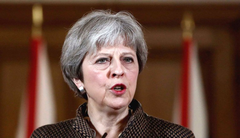 Britain's Prime Minister Theresa May speaks during a press conference at 10 Downing Street in London.
