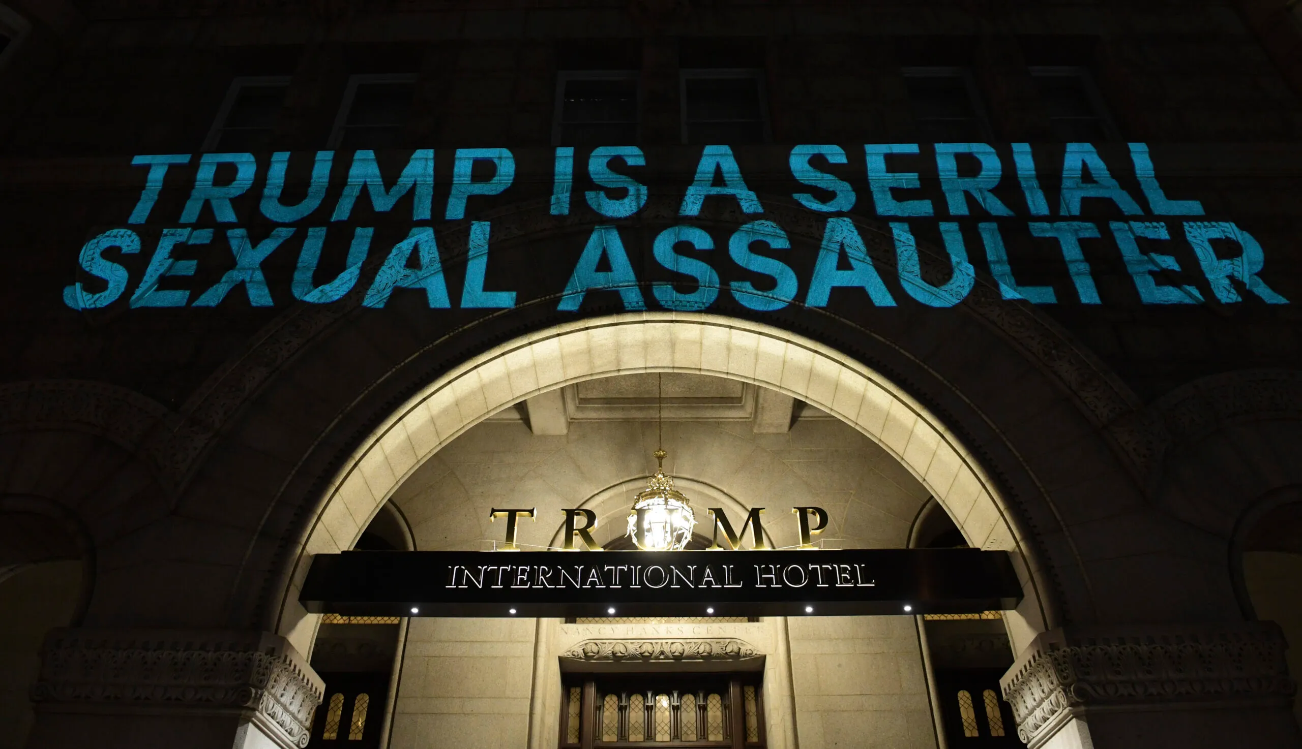 Activists project ‘morally unfit,’ ‘impeach Trump’ on Trump DC hotel