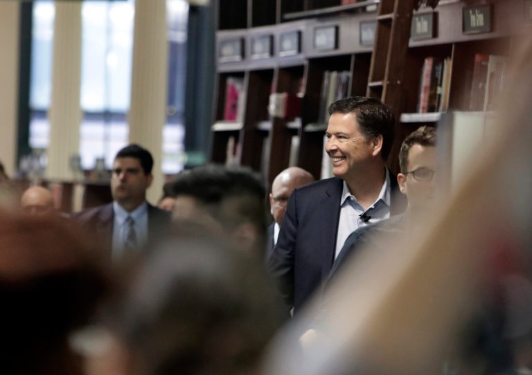 Former FBI director James Comey arrives at a Barnes & Noble book store to speak to an audience Wednesday, April 18, 2018, in New York.