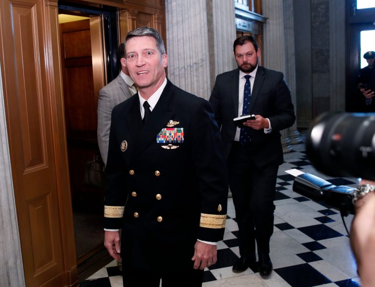 U.S. Navy Rear Adm. Ronny Jackson, M.D., walks on Capitol Hill, Thursday, April 19, 2018 in Washington. Jackson is President Donald Trump's nominee to be the next Secretary of Veterans Affairs.