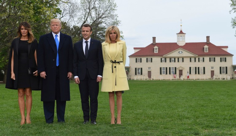 First lady Melania Trump, left, President Donald Trump, second from left, French President Emmanuel Macron, second from right, and his wife Brigitte Macron, right, pose for a photo during a visit and private dinner at George Washington's Mount Vernon estate in Mount Vernon, Va., Monday, April 23, 2018.