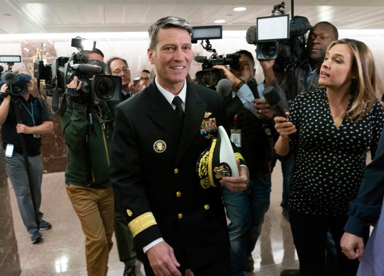 Rear Adm. Ronny Jackson, President Donald Trump's choice to be secretary of the Department of Veterans Affairs, leaves a Senate office building after meeting individually with some members of the committee that would vet him for the post, on Capitol Hill in Washington, Tuesday, April 24, 2018.