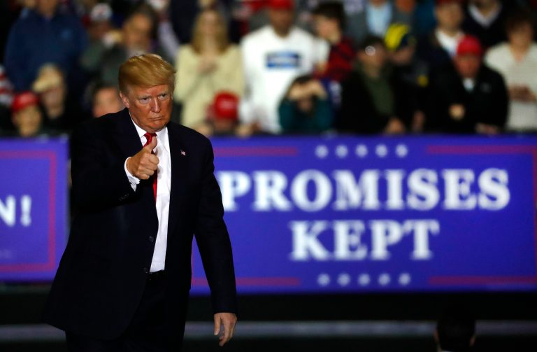 U.S. President Donald Trump gives a thumbs-up during a campaign rally in Washington Township, Mich., Saturday, April 28, 2018.