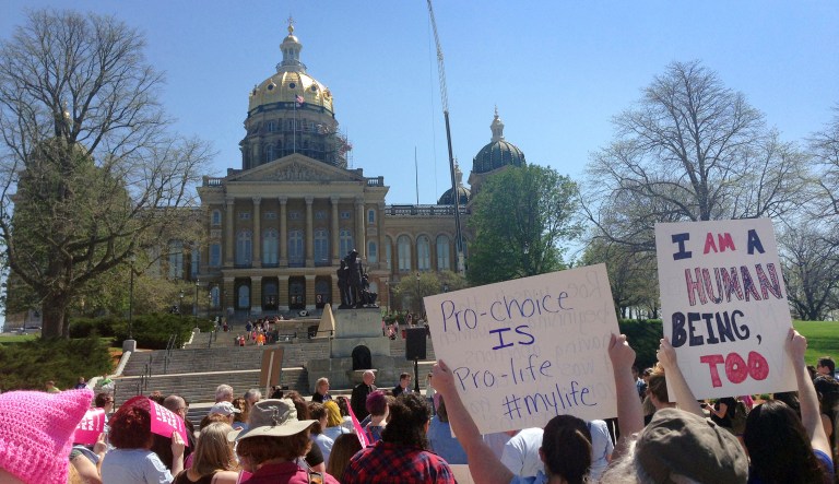 Planned Parenthood supporters rally outside the Iowa Capitol Building on May 4, 2018, in Des Moines, Iowa.