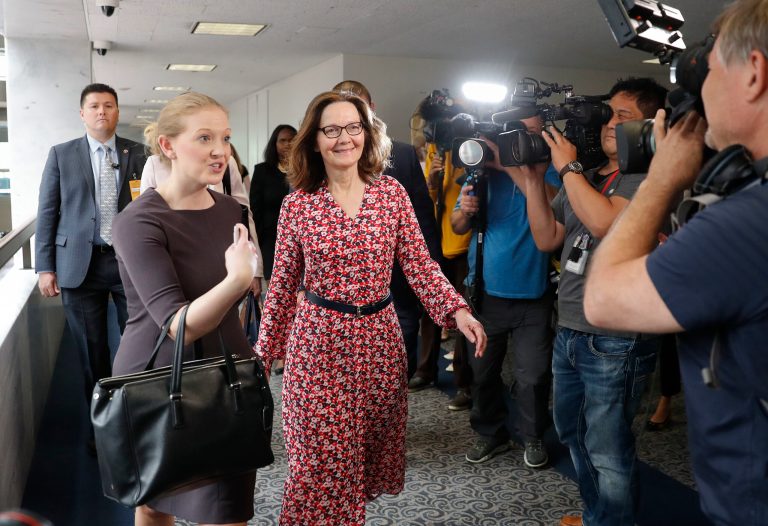 CIA Director nominee Gina Haspel, center, walks past a group of television cameras as she arrives for her meeting with Sen. Dianne Feinstein, D-Calif., on Capitol Hill in Washington, Monday, May 7, 2018. 