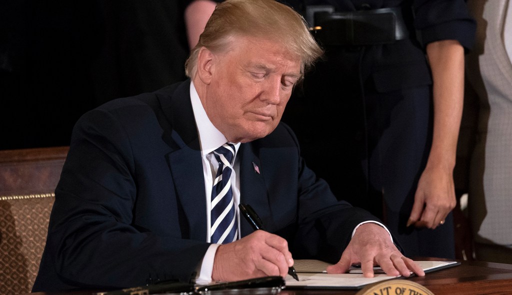 Trump signs bill guaranteeing back pay for federal workers