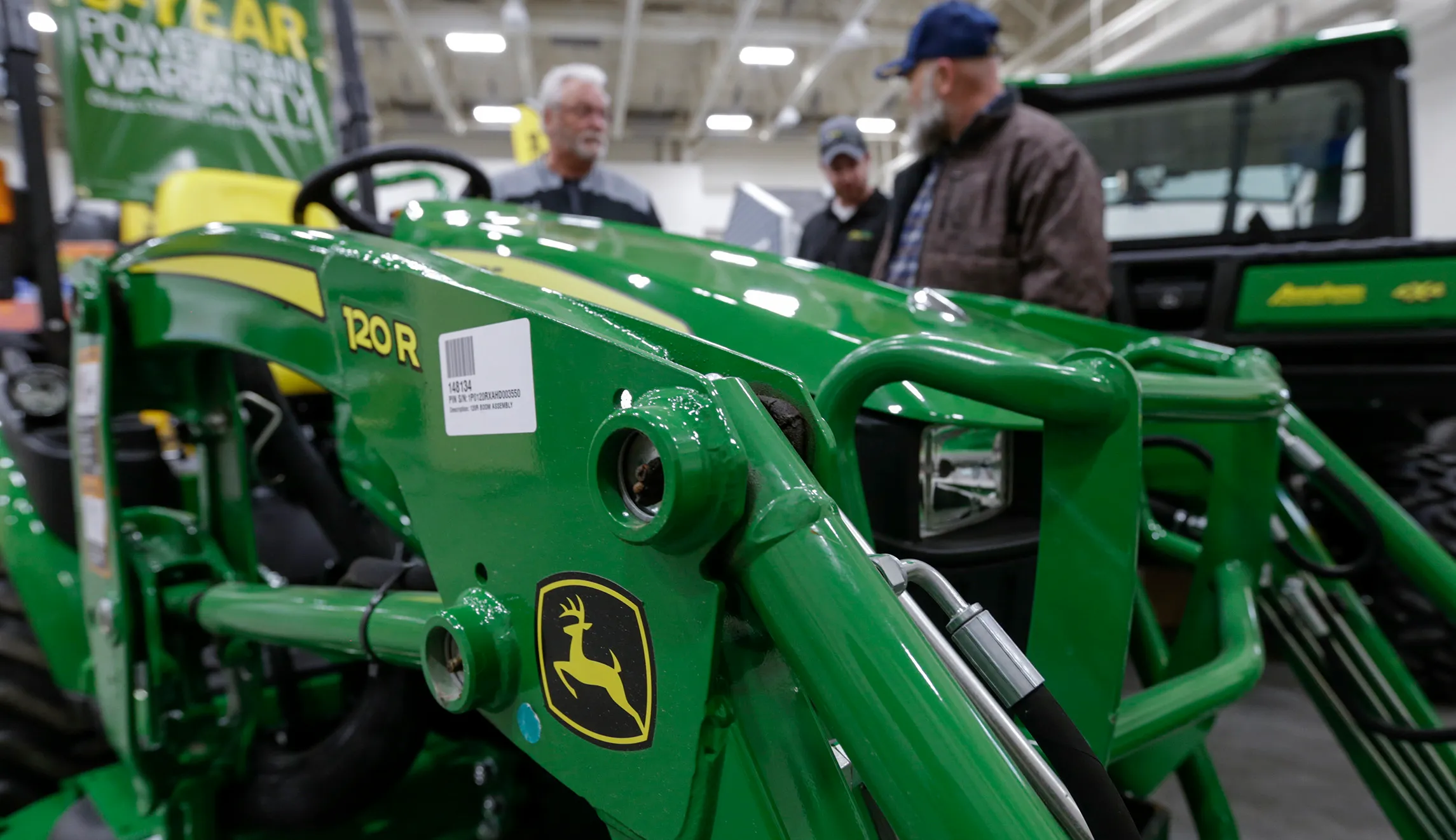 John Deere predicts battered US farmers will cut purchases by $464 million