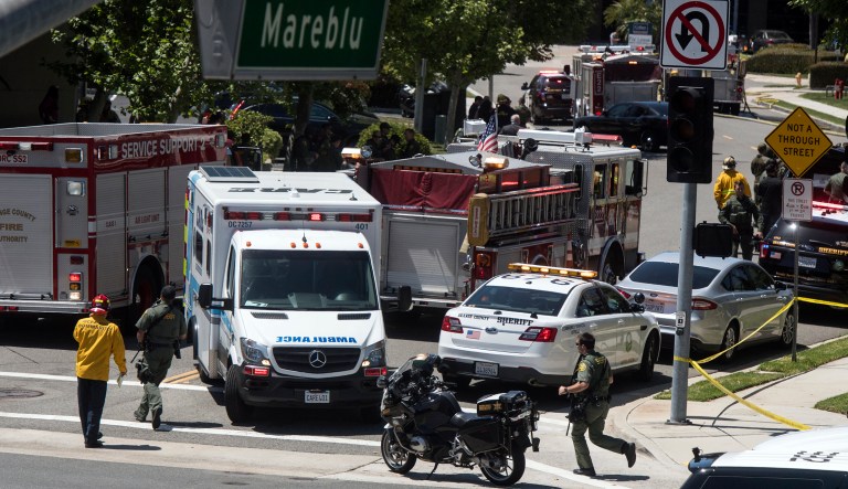 Orange County first responders investigate the scene of an explosion in Aliso Viejo, Calif., on Tuesday. The blast involved a building under renovation, but the cause was not immediately known, according to authorities.