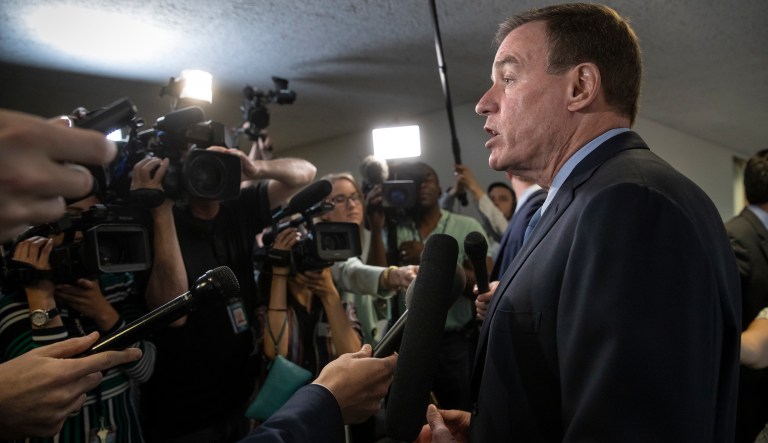 Senate Intelligence Committee Vice Chairman Mark Warner, D-Va., comments to reporters as members of his panel arrive to vote on Gina Haspel, President Donald Trump's pick to lead the Central Intelligence Agency, on Capitol Hill in Washington, Wednesday, May 16, 2018. In announcing his support for the nominee, Warner said Haspel has been "professional and forthright" with the intelligence committee, "Most importantly, I believe she is someone who can and will stand up to the president if ordered to do something illegal or immoral - like a return to torture."