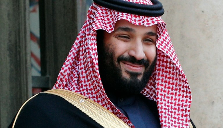 FILE - In this April 10, 2018, file photo, Saudi Arabia Crown Prince Mohammed bin Salman poses before a meeting with French President Emmanuel Macron at the Elysee Palace in Paris. Saudi authorities have detained at least six activists, including three of the country's most prominent women's rights campaigners, just weeks before the kingdom is set to lift a ban on women driving, people familiar with the arrests said Friday, May 18, 2018. Prince Mohammed has relaxed some of the country's ultraconservative rules by allowing women into stadiums to watch sports and bringing back musical concerts and movie theaters.
