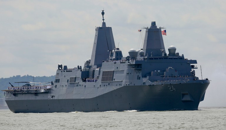 The USS Arlington, from Norfolk, Va., a San Antonio-class amphibious transport dock with several hundred Marines from Camp Lejeune, N.C., arrives on the Hudson River to kickoff 2018 Fleet Week New York, Wednesday May 23, 2018, in New York.
