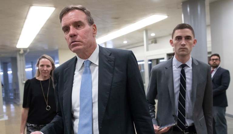 Senate Intelligence Committee Vice Chairman Mark Warner, D-Va., arrives to vote on a bill to expand private care for military veterans as an alternative to the troubled Veterans Affairs health system, on Capitol Hill in Washington, Wednesday, May 23, 2018.