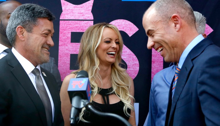 West Hollywood Mayor John Duran, left, Stormy Daniels, center, and attorney Michael Avenatti attend a ceremony for Daniels receiving a City Proclamation and Key to the City on Wednesday, May 23, 2018 in West Hollywood, Calif. 