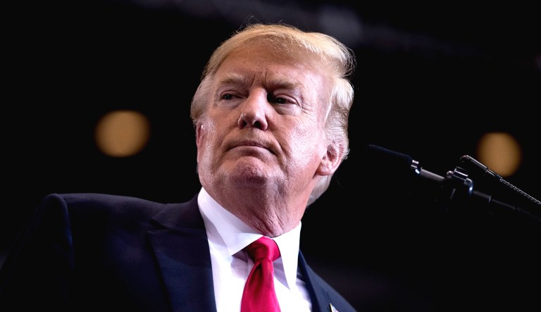 President Trump pauses while speaking at a rally at the Nashville Municipal Auditorium in Nashville, Tenn.