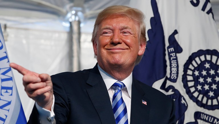 President Donald Trump attends a Change of Command ceremony at the U.S. Coast Guard Headquarters, Friday, June 1, 2018, in Washington. Adm. Paul F. Zukunft will be relieved by Adm. Karl L. Schultz as the Commandant of the U.S. Coast Guard.