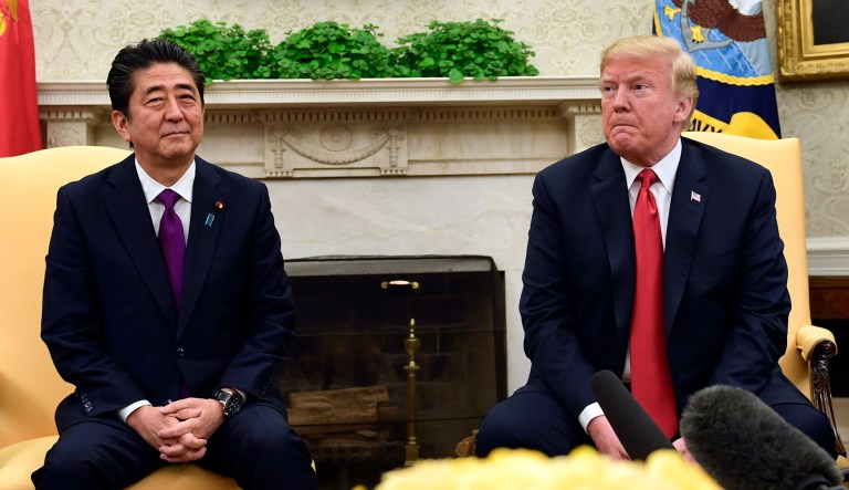 President Trump sits with Japanese Prime Minister Shinzo Abe in the Oval Office of the White House in Washington on Thursday.