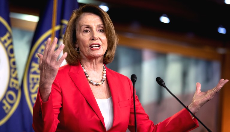 House Minority Leader Nancy Pelosi, D-Calif., talks to reporters during her weekly news conference.