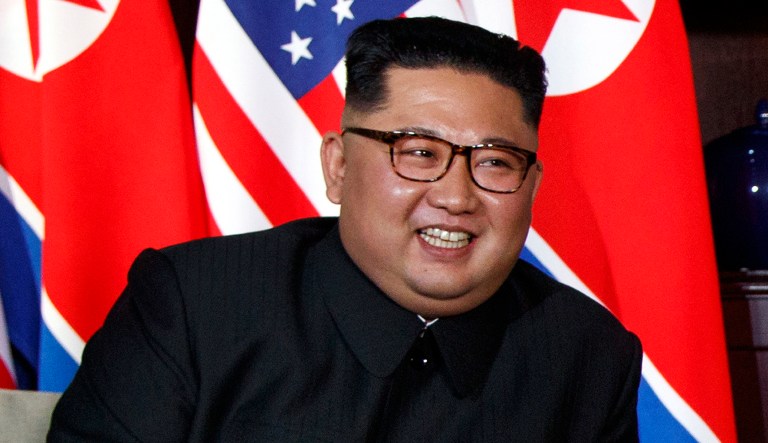 North Korean leader Kim Jong Un smiles as he meets with President Trump on Sentosa Island on Tuesday in Singapore.