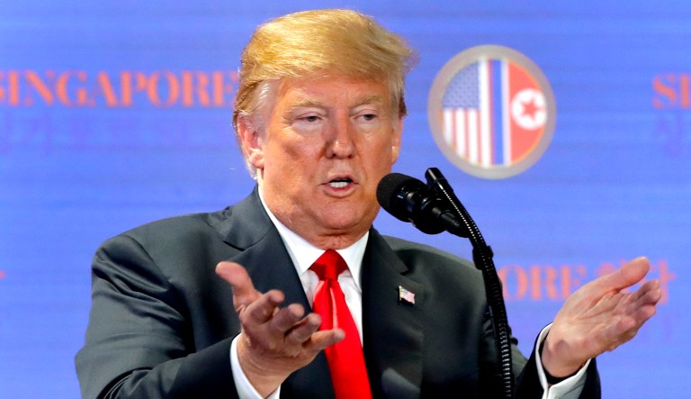 President Trump answers questions about the summit with North Korea leader Kim Jong Un during a press conference at the Capella resort on Sentosa Island, Tuesday, in Singapore.
