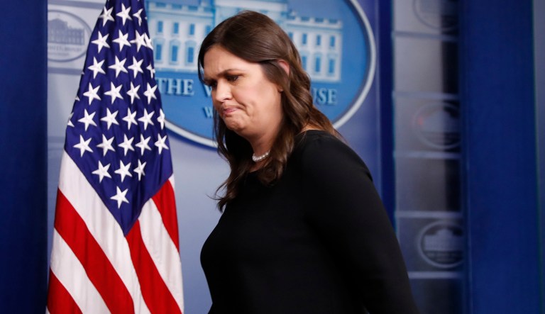 White House press secretary Sarah Sanders walks away from the podium after speaking to the media at the daily briefing in the White House on June 14, 2018.