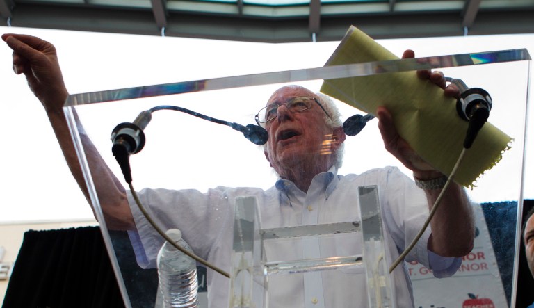 Sen. Bernie Sanders, I-Vt., accompanied by Democrat Ben Jealous, speaks to the crowd during a gubernatorial campaign rally in Maryland's Democratic primary at downtown Silver Spring, Md., Monday, June 18, 2018.