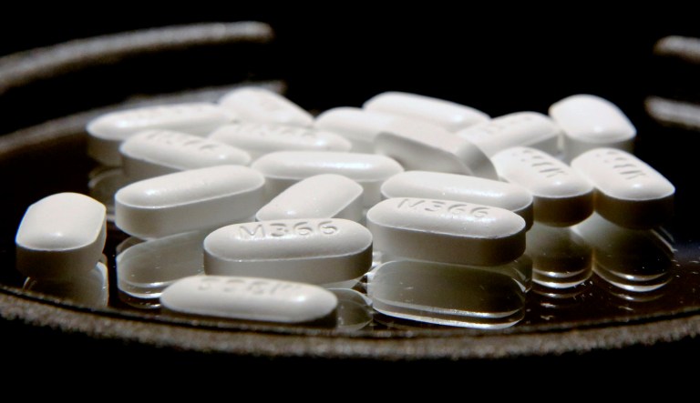 Acetaminophen pills are shown.