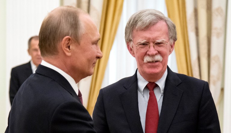 Russian President Vladimir Putin, left, invites U.S. national security adviser John Bolton for the talks during their meeting in the Kremlin in Moscow, Russia, Wednesday. President Trump's national security adviser is due in Moscow Wednesday to lay the groundwork for a possible U.S.-Russia summit.