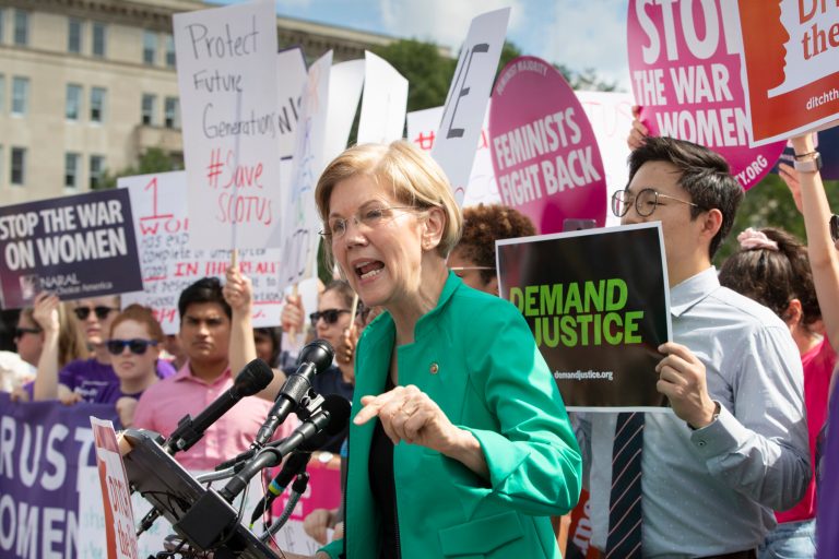 Sen. Elizabeth Warren, D-Mass., joins activists at the Supreme Court as President Donald Trump prepares to choose a replacement for Justice Anthony Kennedy, on Capitol Hill in Washington, Thursday, June 28, 2018.