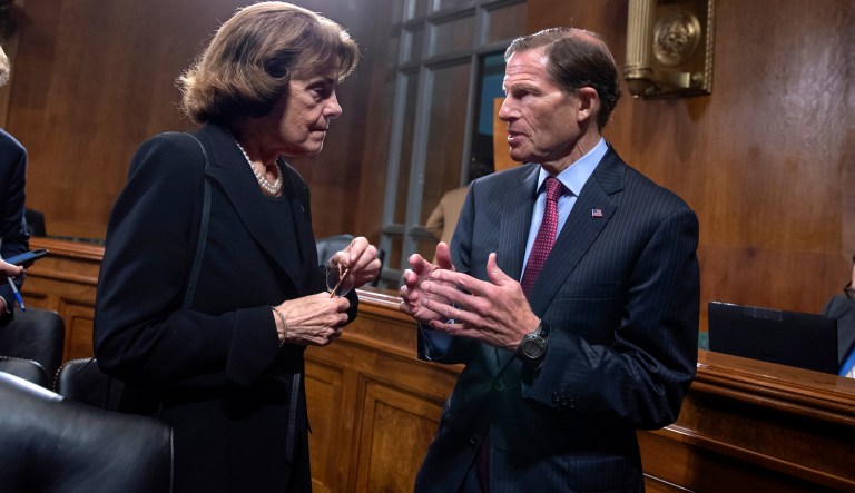 Sen. Dianne Feinstein, D-Calif., the ranking member on the Senate Judiciary Committee, left, speaks with Sen. Richard Blumenthal, D-Conn., after a markup session to vote on new federal judges, on Capitol Hill in Washington, Thursday, June 28, 2018. The Judiciary Committee oversees the confirmation process for presidential nominees to the Supreme Court.
