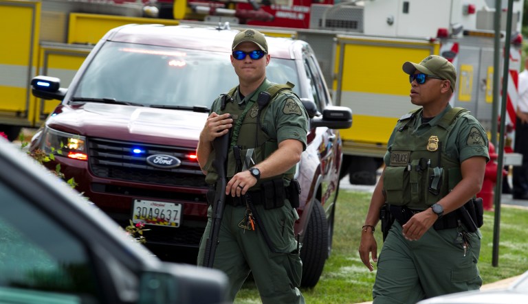 Maryland police officers patrol the area after multiple people were shot at at The Capital Gazette newspaper in Annapolis, Md., Thursday, June 28, 2018.