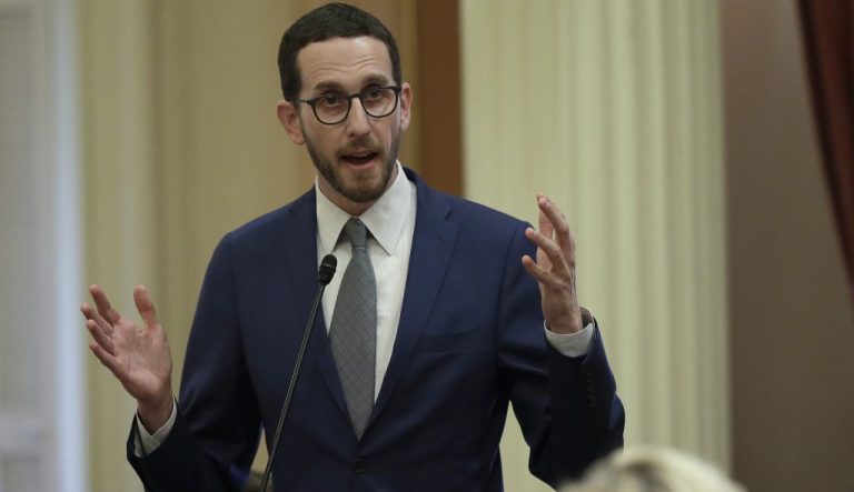 State Sen. Scott Wiener, D-San Francisco, urges members of the Senate to reject a soda tax measure, Thursday, June 28, 2018, in Sacramento, Calif. Lawmakers passed the bill to ban local taxes on soda for the next 12 years and sent it to Gov. Jerry Brown.