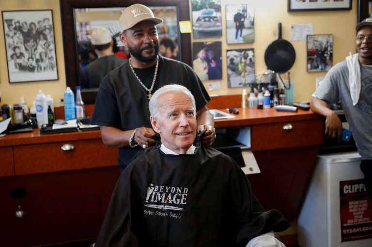 Former Vice President Joe Biden campaigns with Democratic gubernatorial candidate Richard Cordray at the Beyond Image Barber Salon, Friday, June 29, 2018, in Cincinnati.