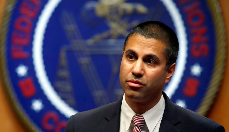 In this Dec. 14, 2017, file photo, Federal Communications Commission Chairman Ajit Pai arrives for an FCC meeting in Washington.