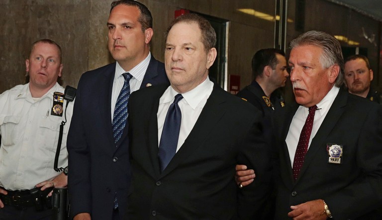 Harvey Weinstein is escorted in handcuffs to a courtroom in New York, Monday, July 9, 2018. Weinstein, who was previously indicted on charges involving two women, was due in court for arraignment on charges alleging he committed a sex crime against a third woman. 