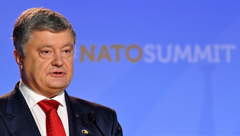 Ukraine's President Petro Poroshenko attends a press conference with NATO Secretary-General Jens Stoltenberg during a summit.