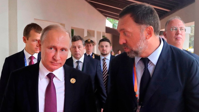 Russian President Vladimir Putin, left, and Oleg Deripaska, right, attend the APEC Business Advisory Council dialogue in Danang, Vietnam.