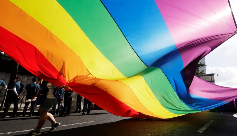 A huge rainbow flag is carried during a parade as a part of the Seoul Queer Culture Festival in Seoul, South Korea, Saturday, July 14, 2018. More than thousands of supporters and visitors participate in the 19th Seoul Queer Culture Festival which is held from July 13 until July 22. 