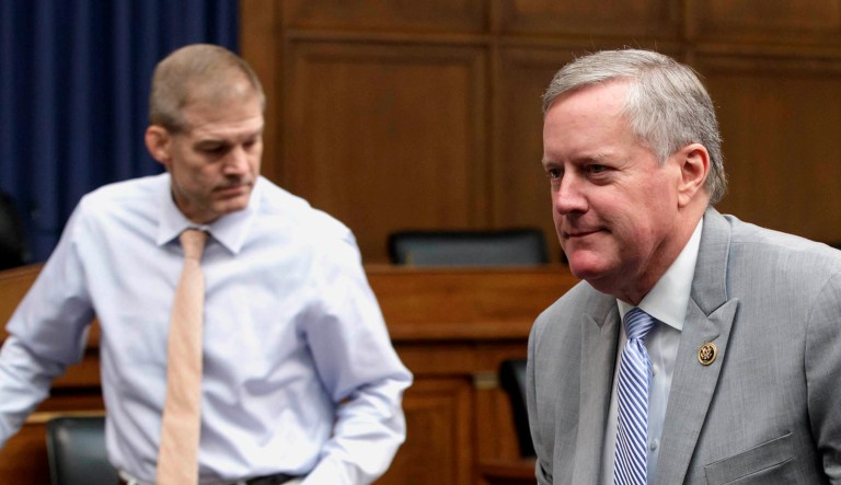 Rep. Mark Meadows, R-N.C., right, chairman of the conservative House Freedom Caucus, and Rep. Jim Jordan, R-Ohio, its founding member, leave an event.