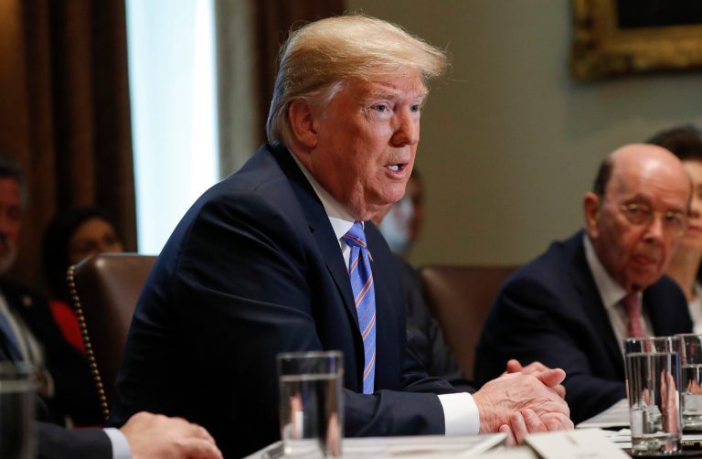 President Donald Trump speaks during his meeting with members of his cabinet in Cabinet Room of the White House in Washington, Wednesday, July 18, 2018. Also at the meeting is Commerce Secretary Wilbur Ross.