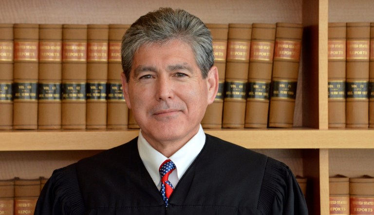 Judge Dana Sabraw is pictured in San Diego. Judge Sabraw, who ordered children be reunited with their families after being separated at the US-Mexico border, has been unyielding in his insistence that the Trump administration meet his deadline. 