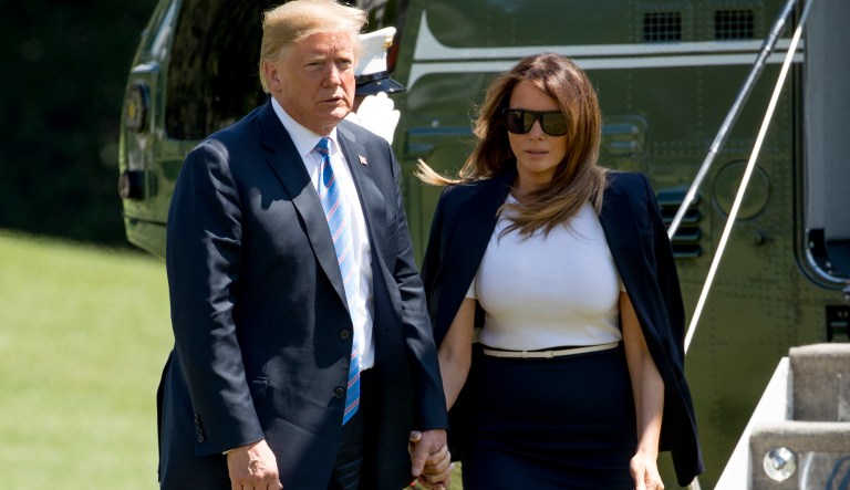 President Donald Trump and first lady Melania Trump arrive on the South Lawn of the White House in Washington, Wednesday, July 18, 2018. The president and the first lady are returning from Andrews Air Force Base after paying their respects to the family of fallen U.S. Secret Service special agent Nole Edward Remagen who suffered a stroke while on duty in Scotland.