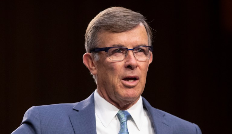 Retired Vice Adm. Joseph Maguire appears at a hearing.