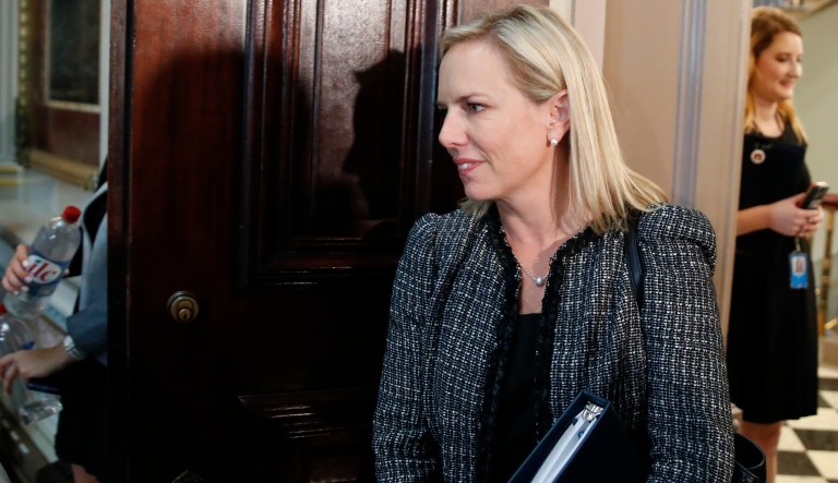 Homeland Security Secretary Kirstjen Nielsen arrives for a meeting of the Federal Commission on School Safety in the Indian Treaty Room of the Eisenhower Executive Office Building, Thursday, July 26, 2018, in Washington.
