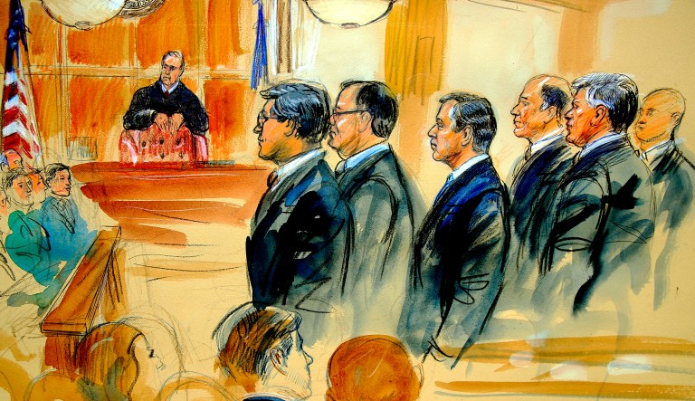 This courtroom sketch depicts Paul Manafort standing with his lawyers in front of U.S. district Judge T.S. Ellis III at the Alexandria Federal Courthouse in Alexandria, Va., on July 31, 2018.
