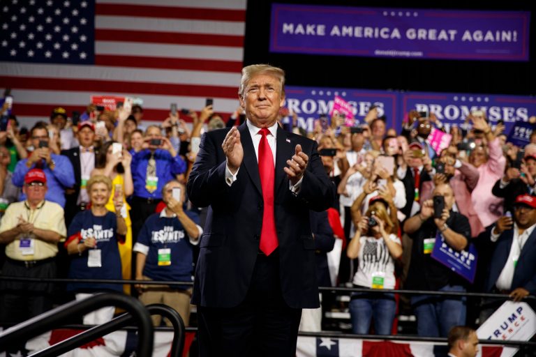 President Donald Trump arrives to speak at a campaign rally at Florida State Fairgrounds Expo Hall, Tuesday, July 31, 2018, in Tampa, Fla.