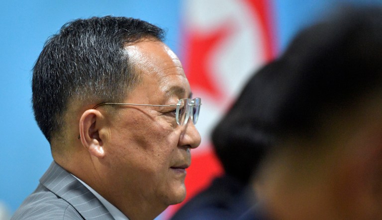 North Korea's Foreign Minister Ri Yong Ho listens to China's Foreign Minister Wang Yi, not seen, during a bilateral meeting on the sidelines of the 51st ASEAN Foreign Ministers Meeting in Singapore.